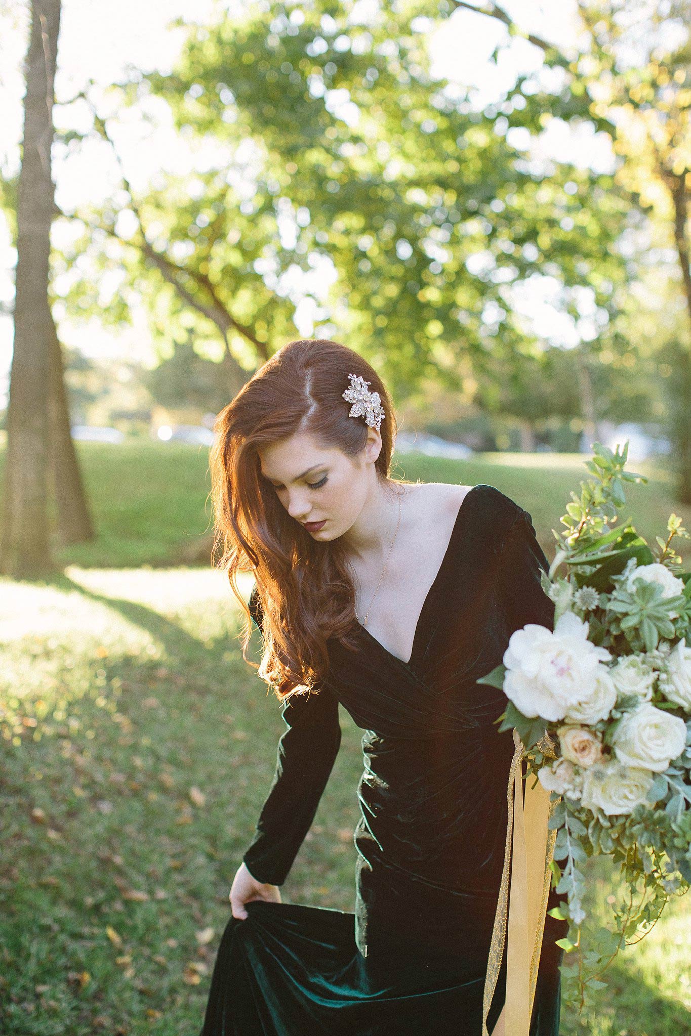 aristide mansfield wedding bridesmaid in green dress picking up dress
