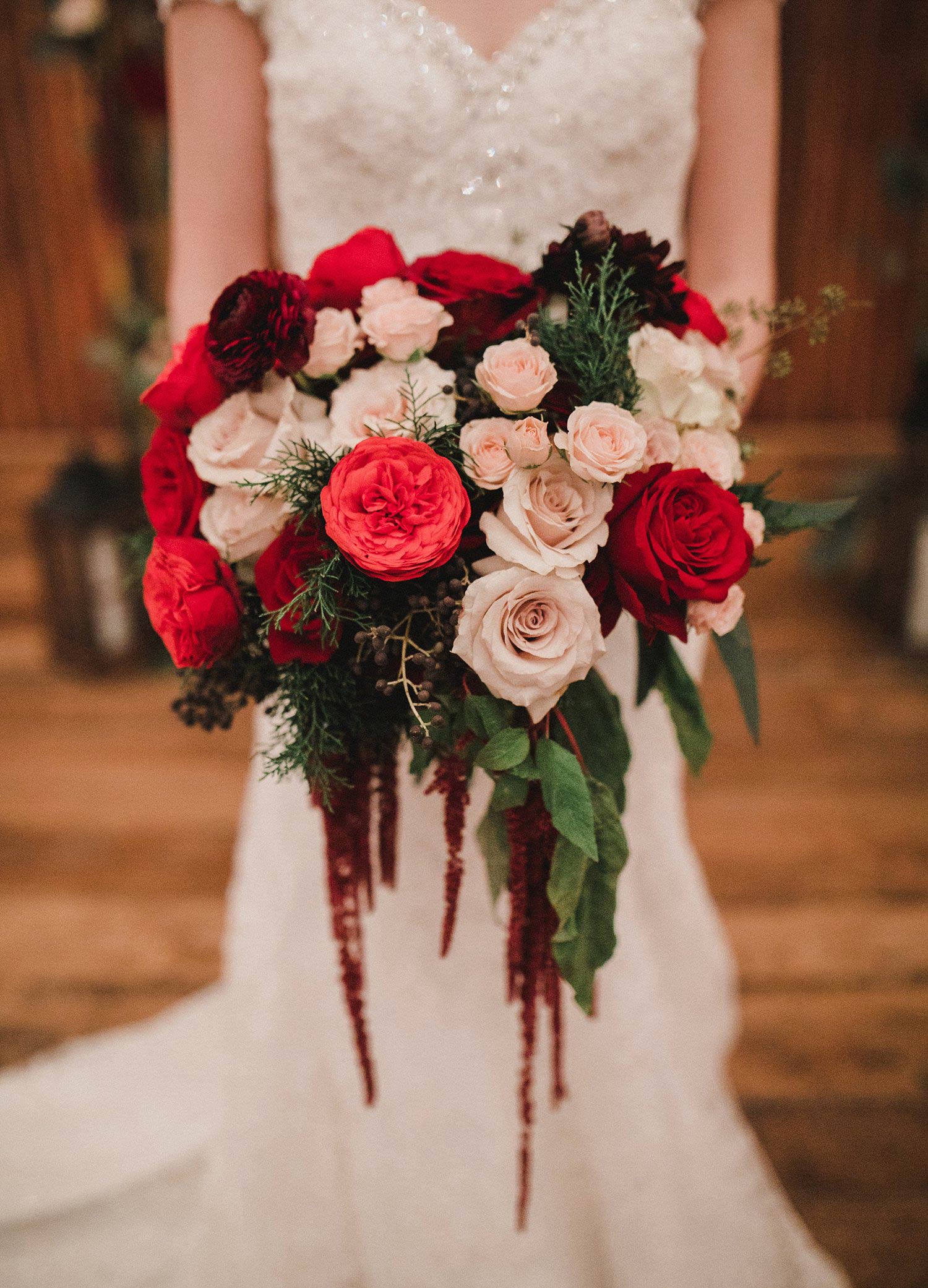 Hollow Hill Event Center wedding red cream and burgundy bridal bouquet