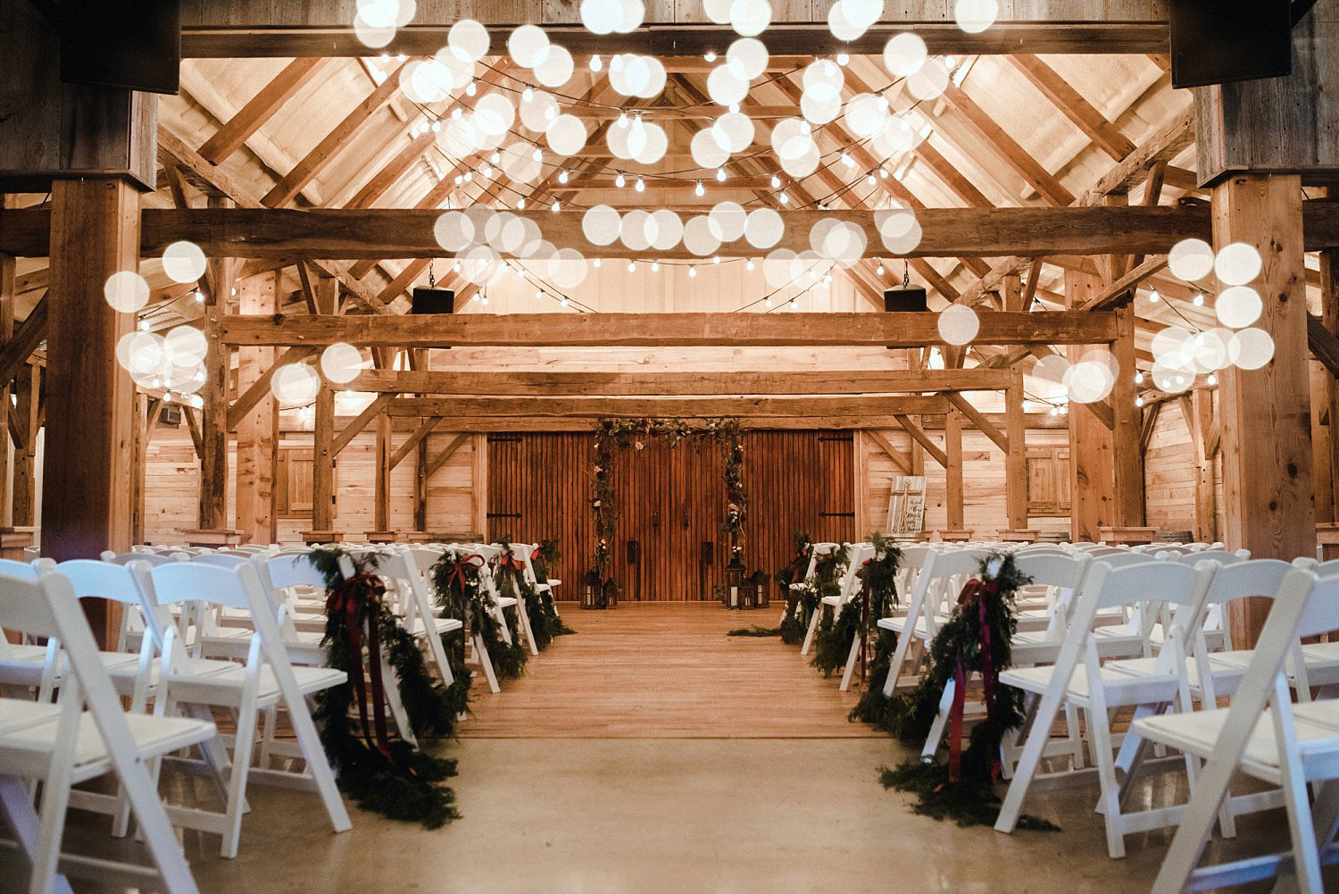 Hollow Hill Farm Event Center Wedding ceremony in wood barn