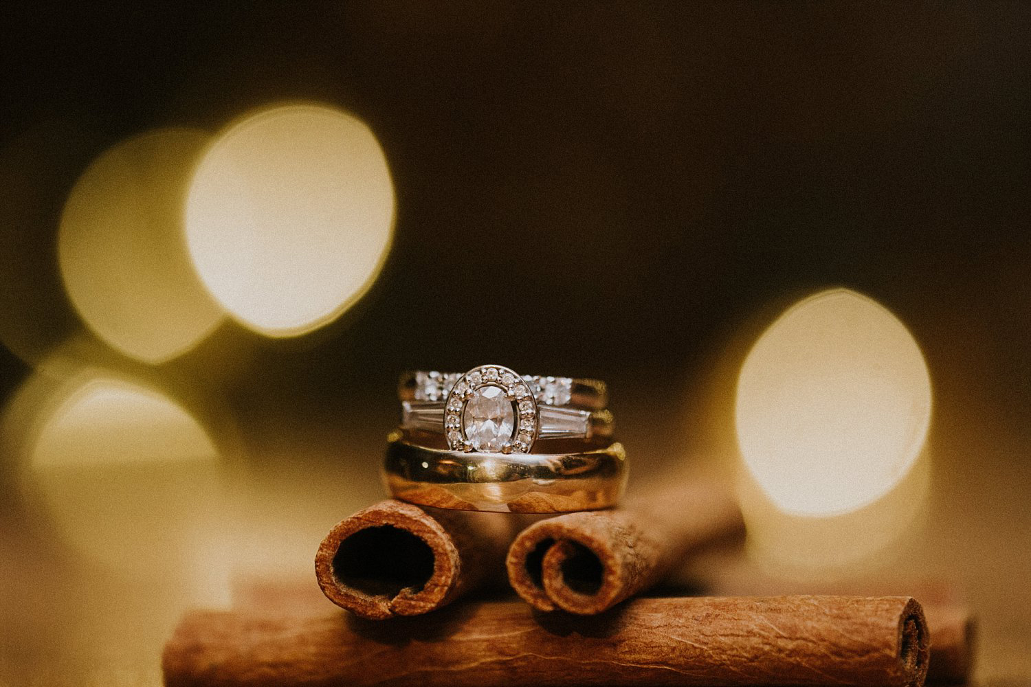 Hollow Hill Farm Event Center Wedding photo of rings on cinnamon sticks