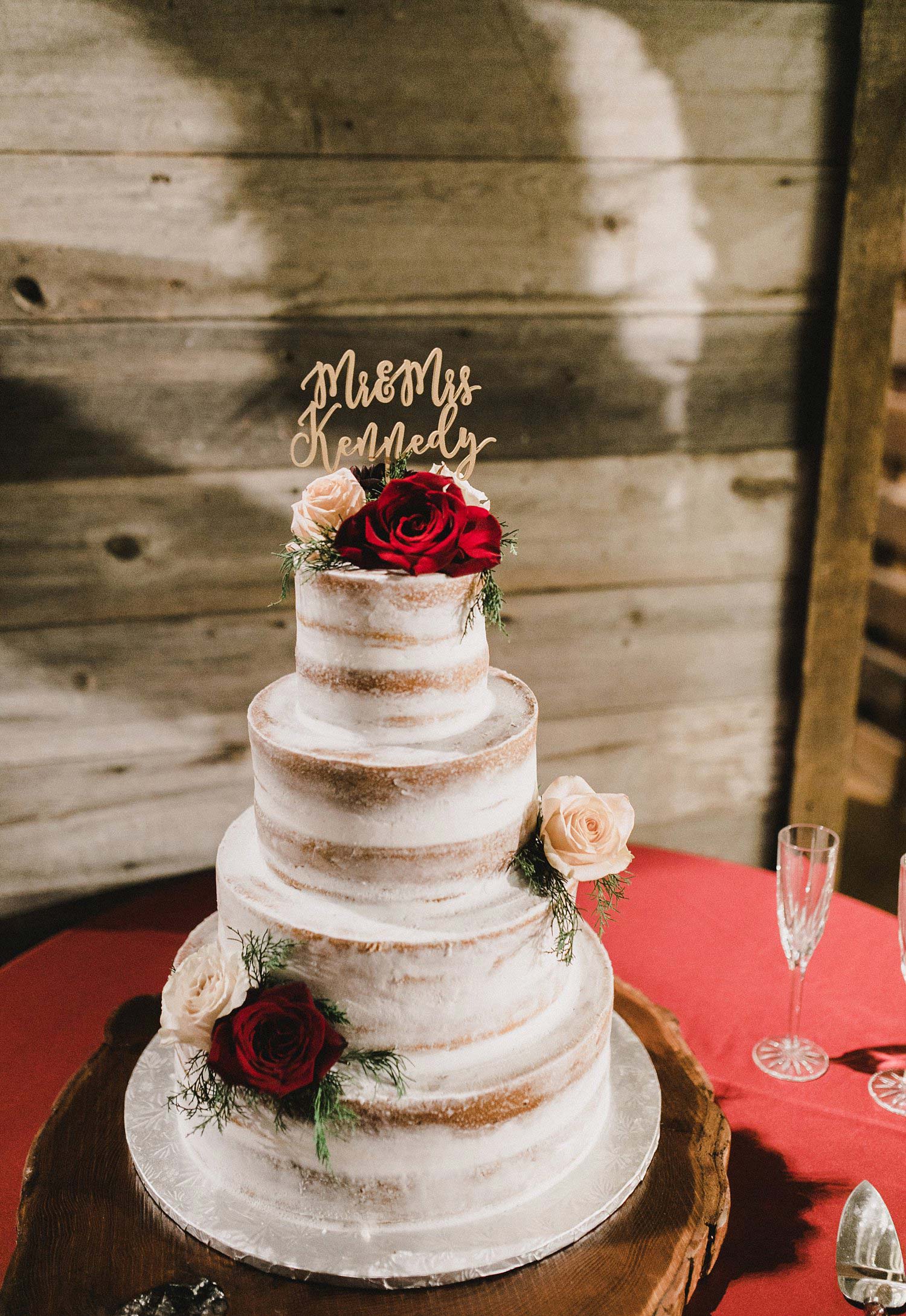 Hollow Hill Farm Event Center Wedding naked cake with Red flower in old town