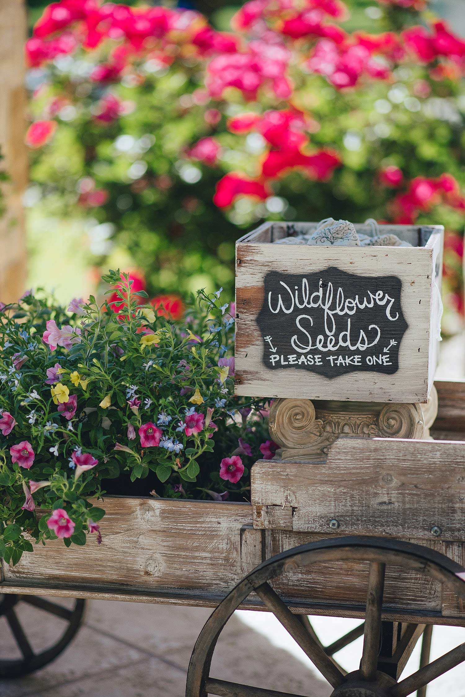 The Orchard Azle wedding seed favors in wagon