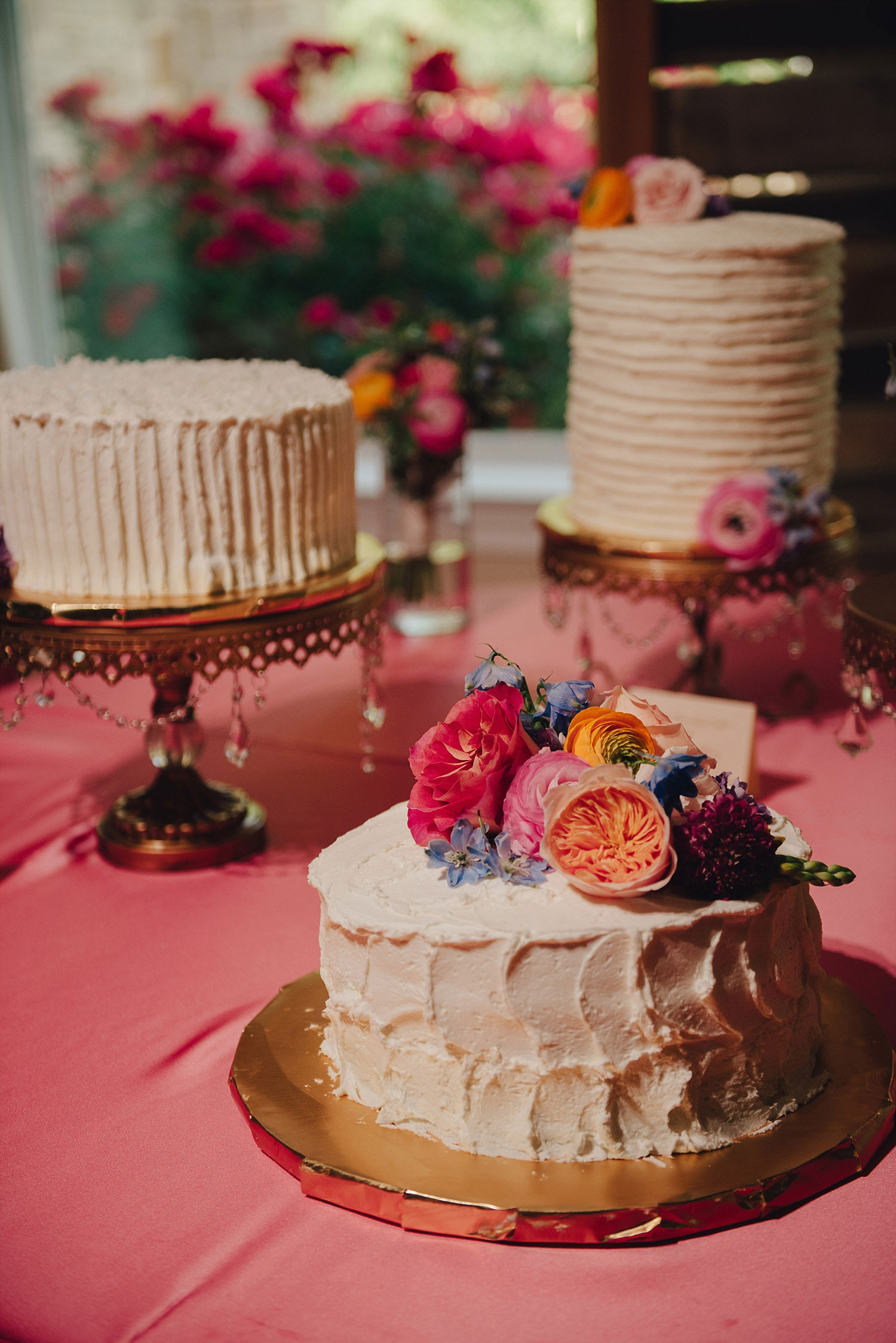 wedding cake on pink linen