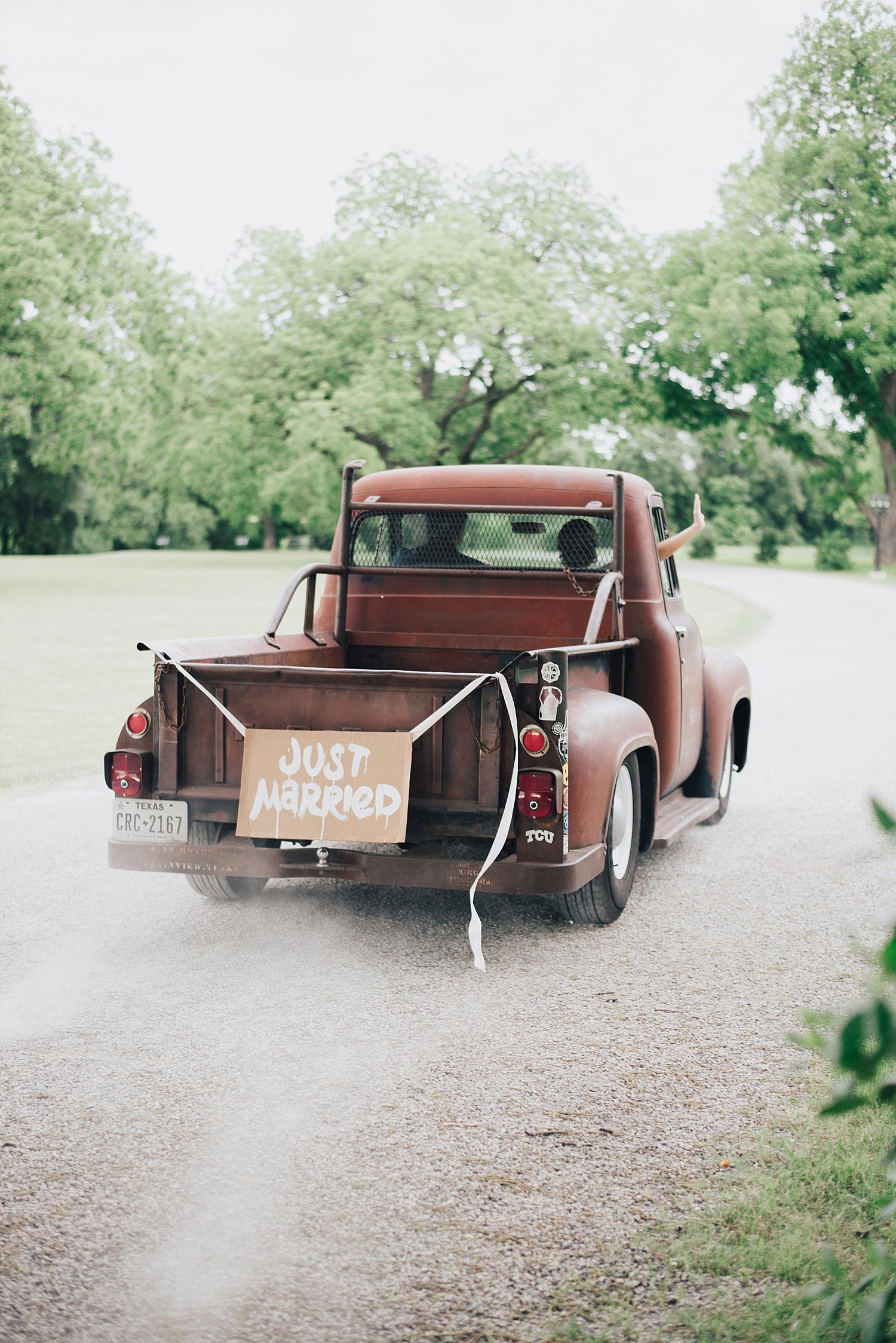 The Orchard Azle wedding vintage truck exit