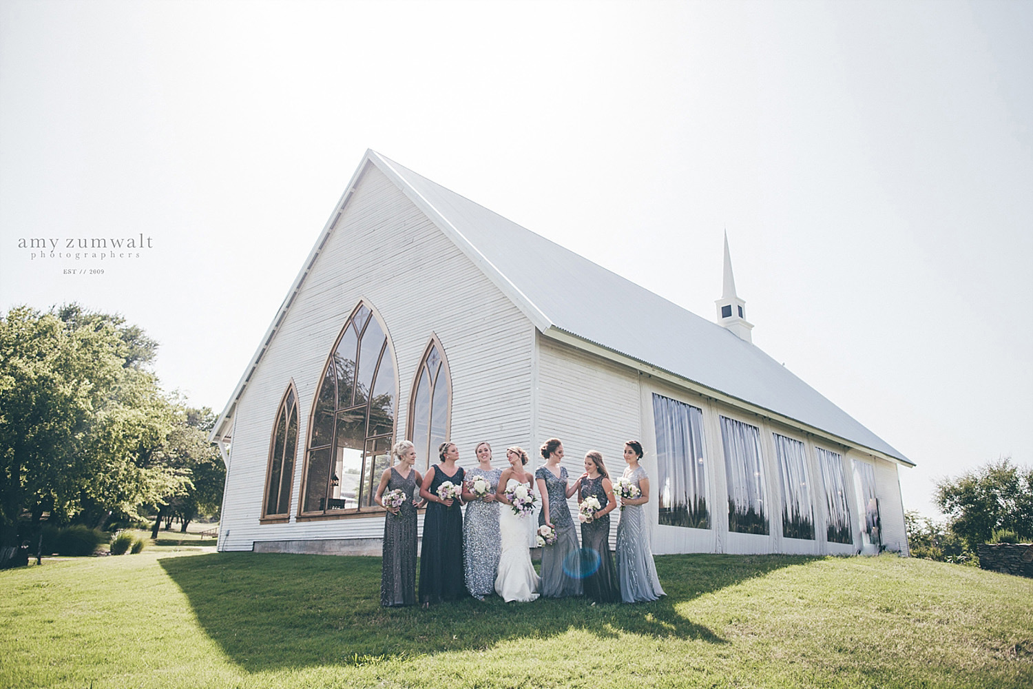 The Brooks at Weatherford white chapel with bridesmaids in sequin silver dresses