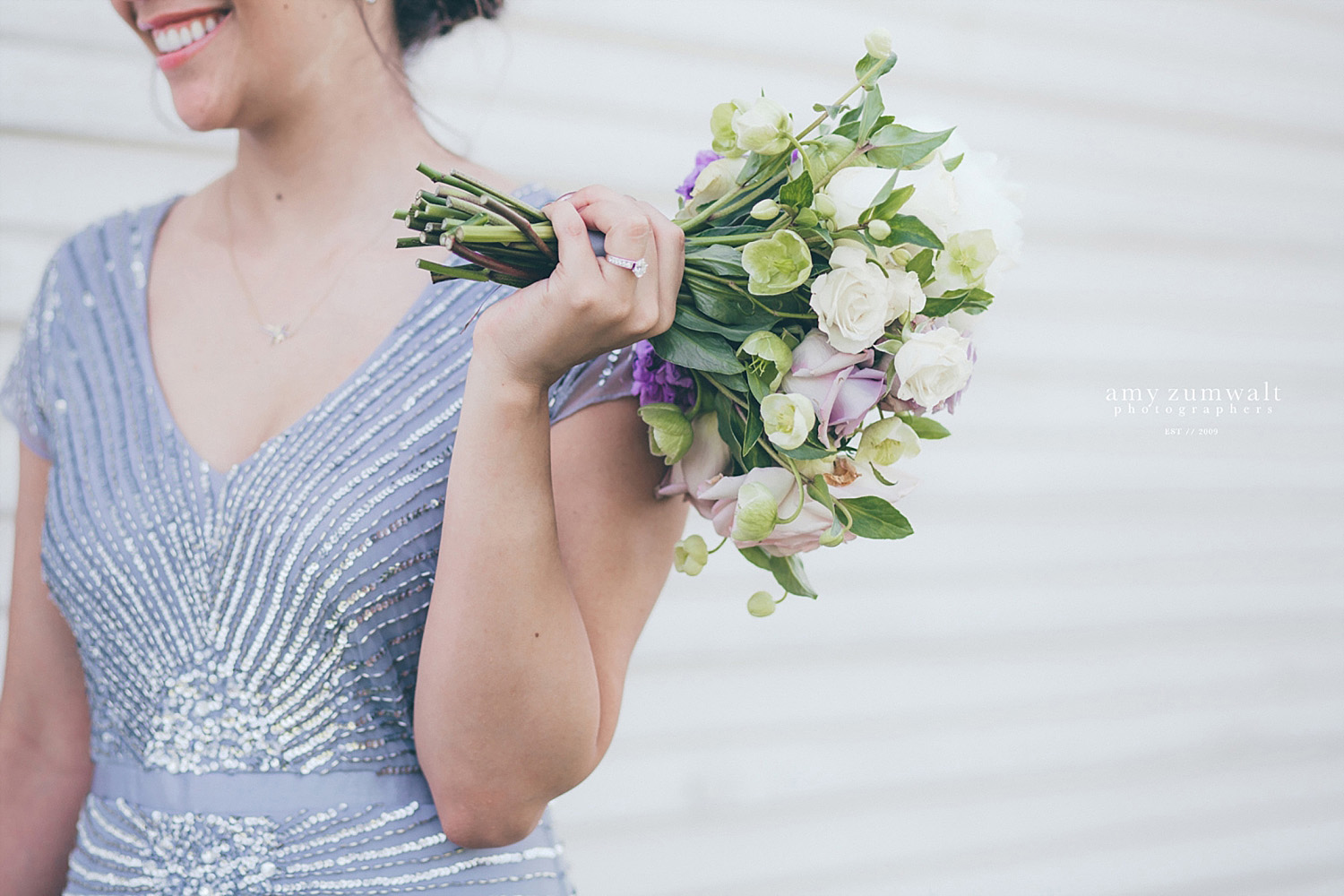 Brooks at Weatherford wedding bridesmaid holding lavender and white bouquet in sequin dress
