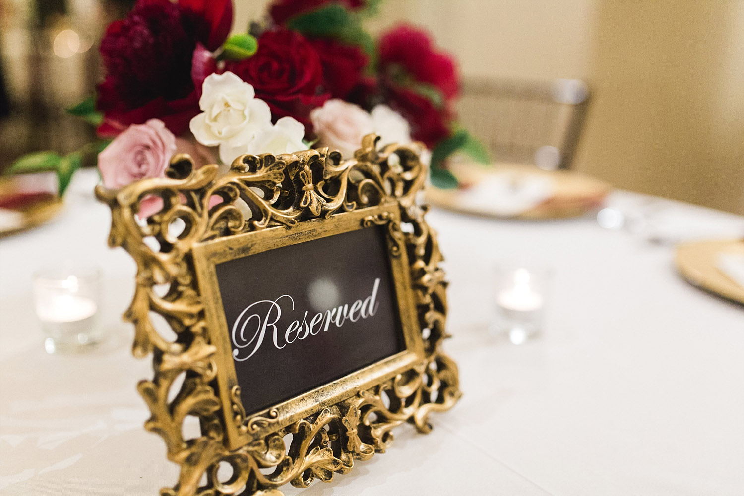 Castle at Rockwall wedding ornate gold frame for reserved tables