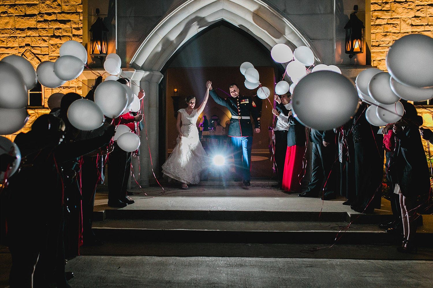 Castle at Rockwall wedding bride and groom exit with LED balloons