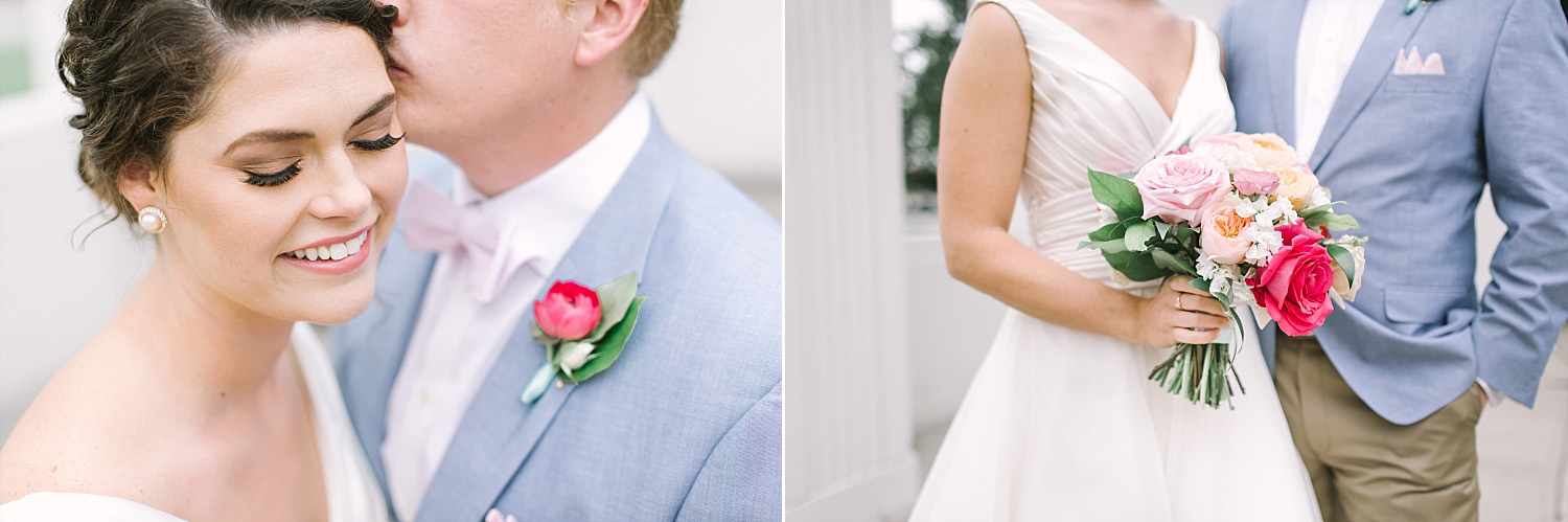 Bride holding colorful bridal bouquet with pink, orange, and blush flowers