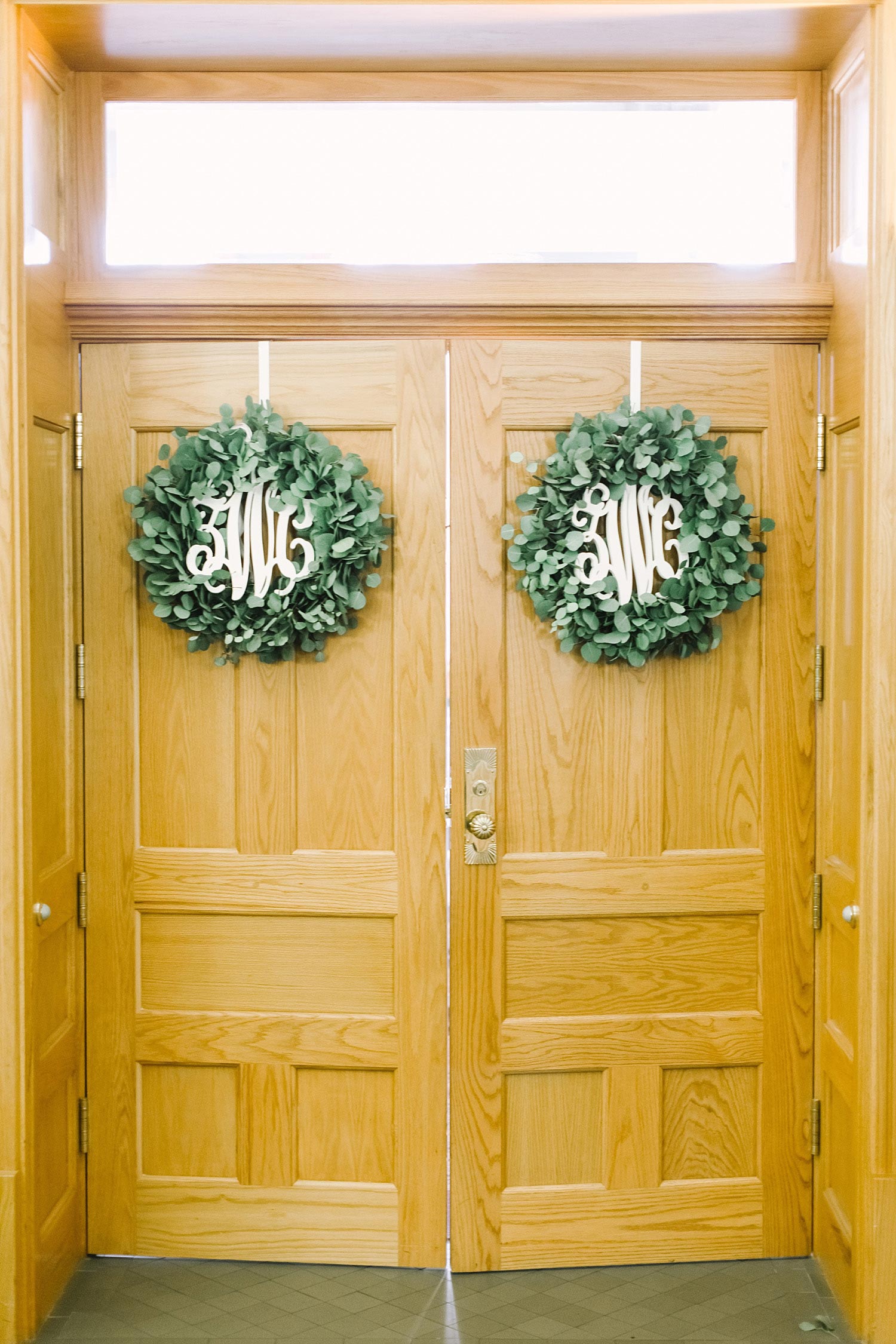 Old Red Museum wreaths on the ceremony doors with monograms in center