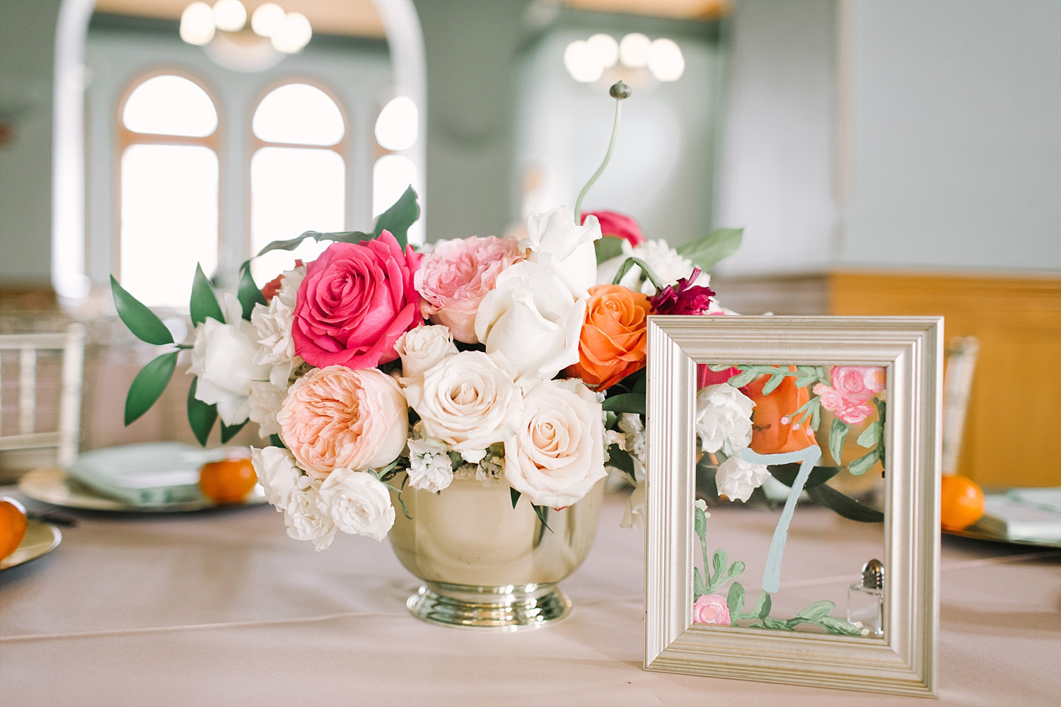 Old Red Museum wedding reception flower painted frame table numbers and pink orange blush flowers