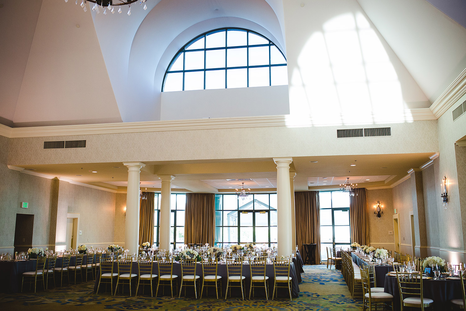 River Crest Country Club interior ballroom reception with tall arched ceilings