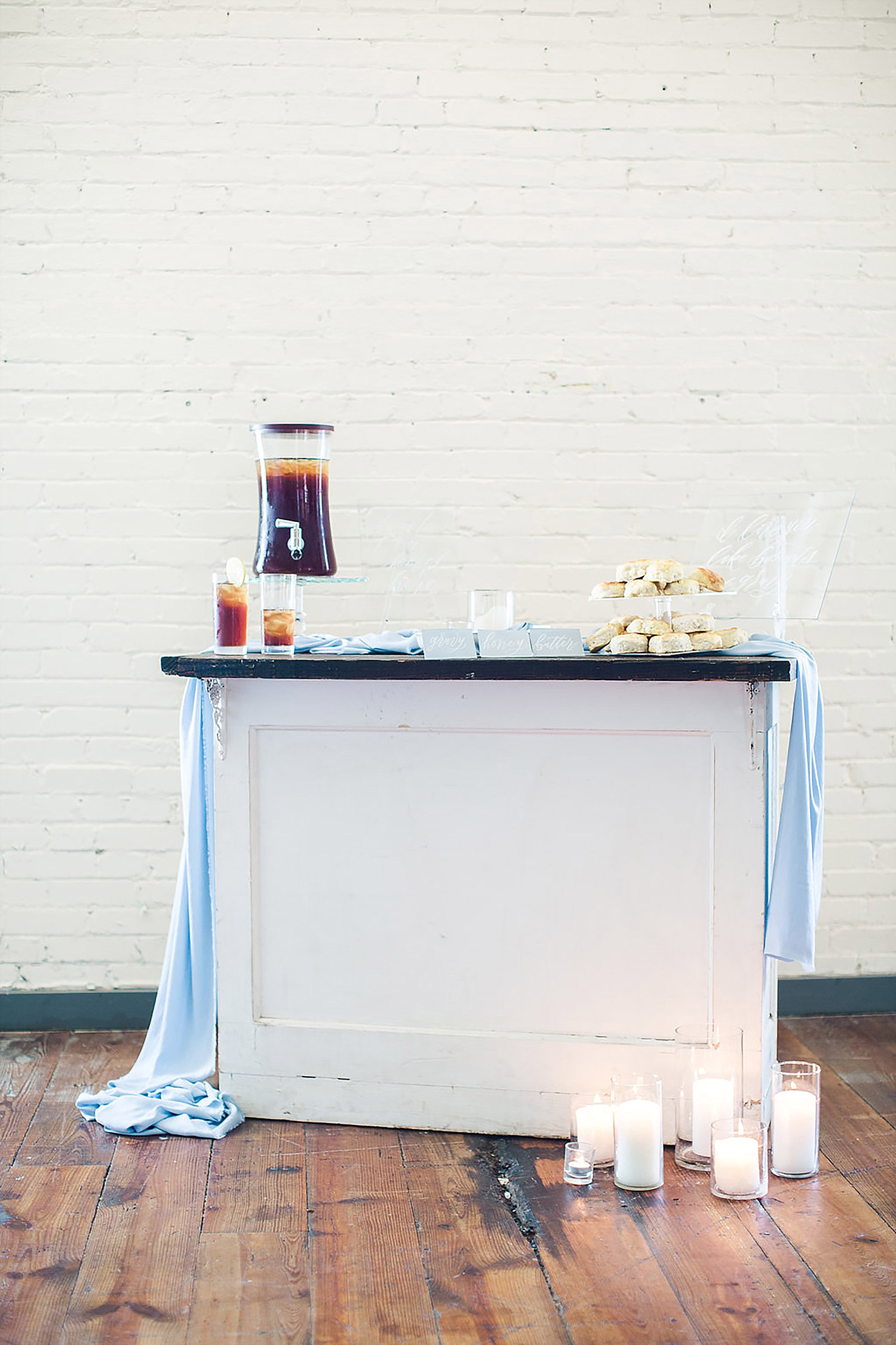 Southern wedding biscut bar with acrylic signage and sweet tea at the Brik Venue in Fort Worth.