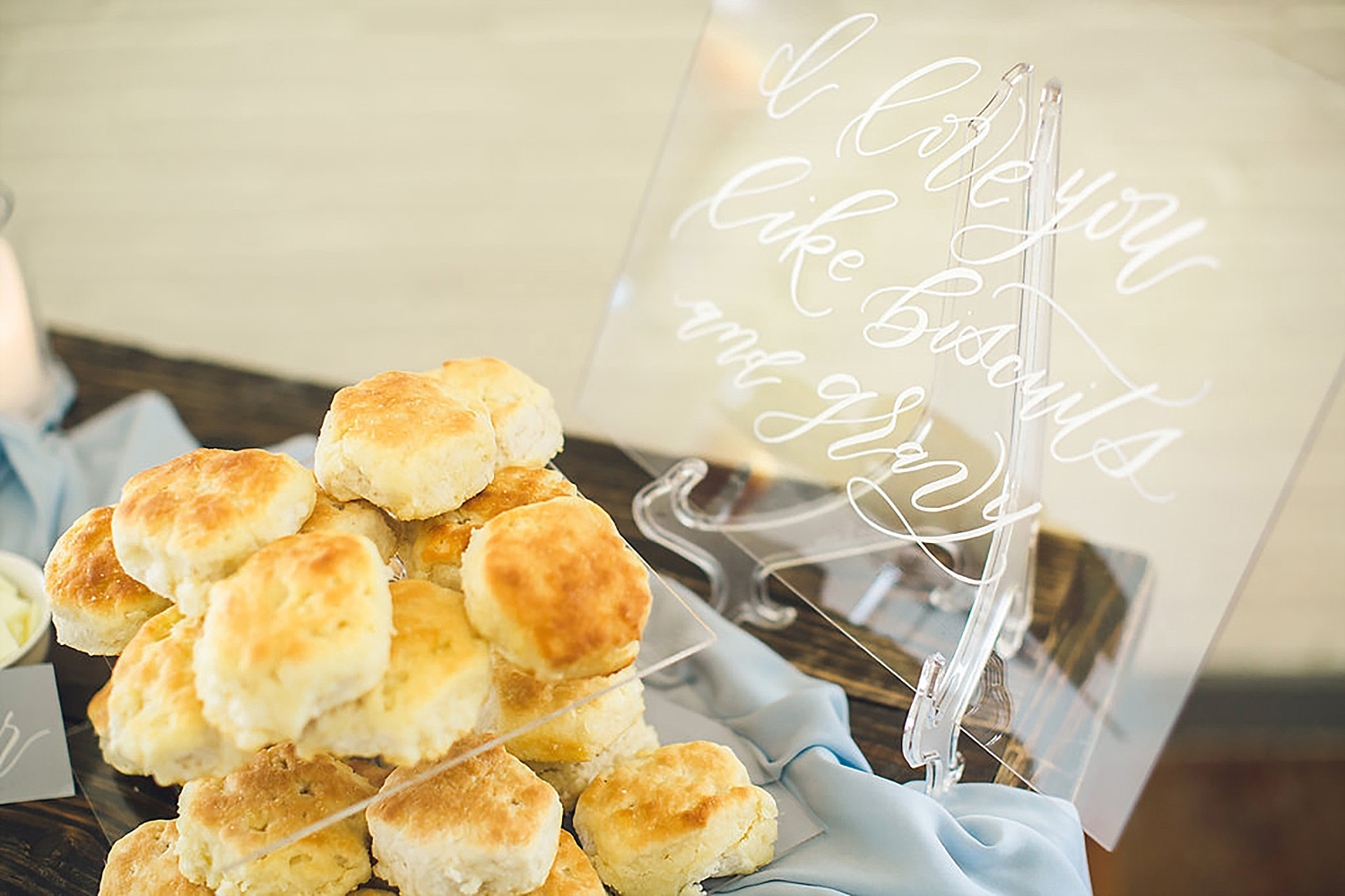 Acrylic signage for a southern wedding biscuit bar at Brik Venue