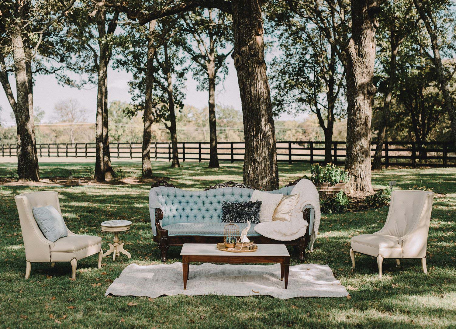 This outdoor blue and white wedding lounge at White Sparrow Barn was perfect for this barn wedding.