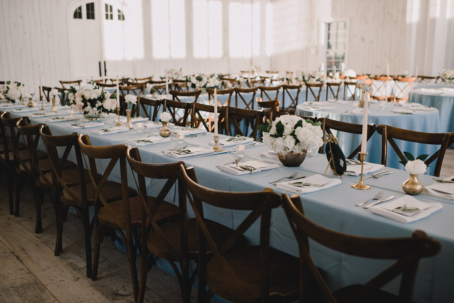 Rectangle dusty blue tables in White Barn