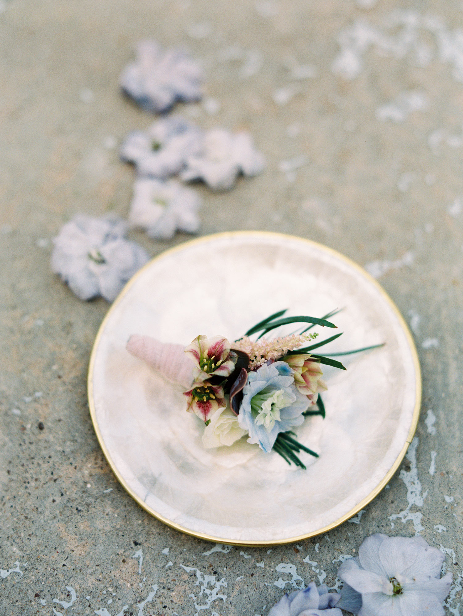 lavender boutinere on a white plate