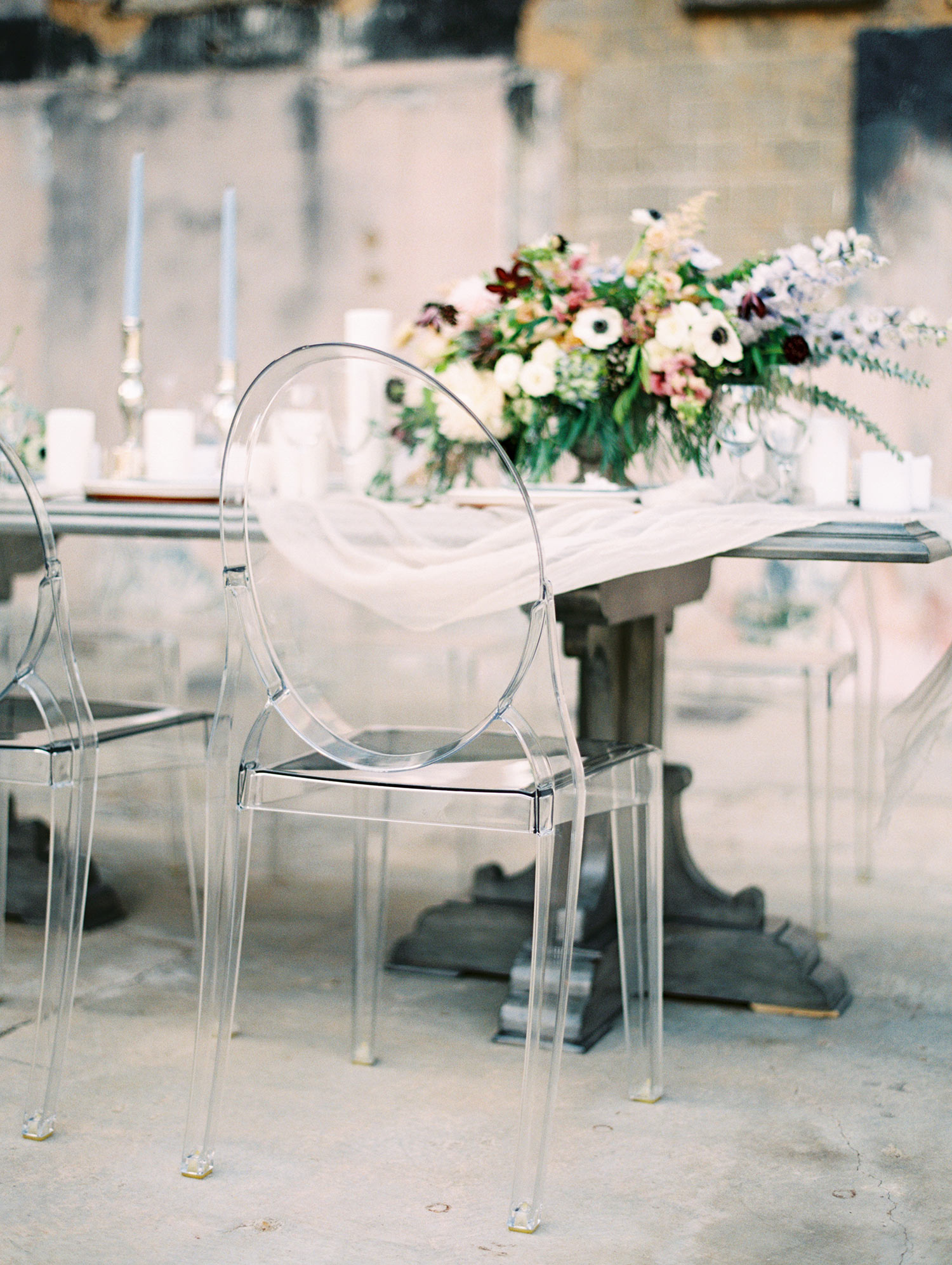 Grey farm table with ghost chairs