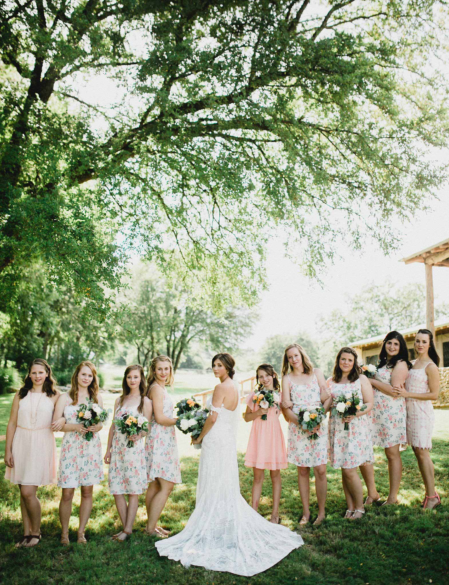 Bridesmaids where short floral print dress for a summer rustic wedding
