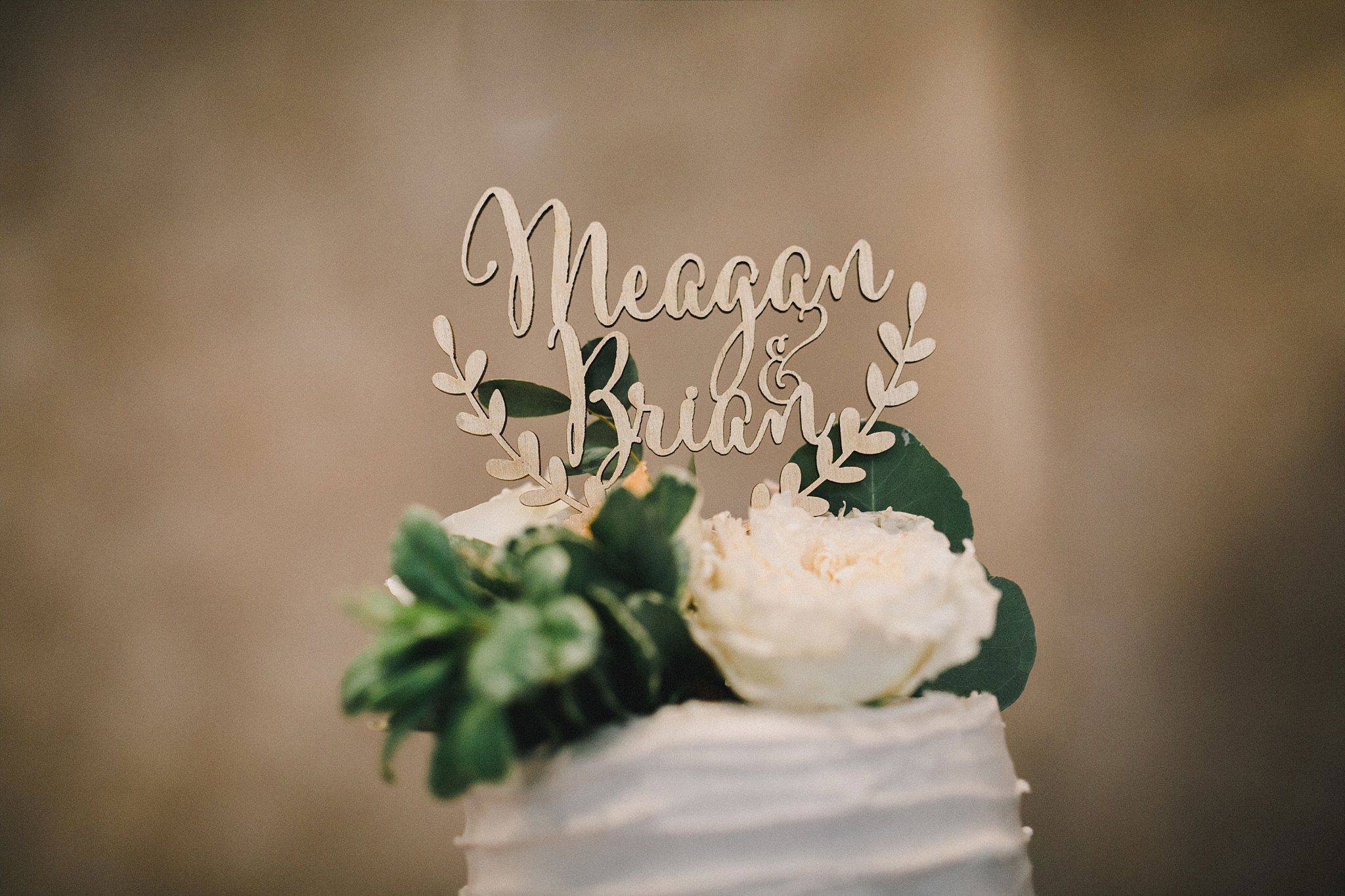Wood laser cut cake topper with greenery