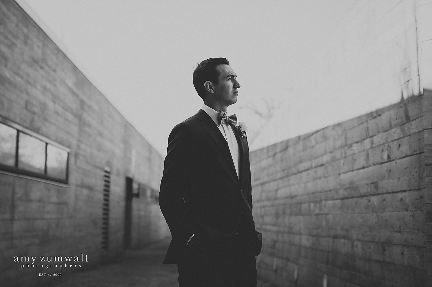 black and white photo of a groom