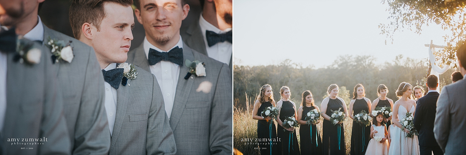 Groomsmen in grey suites wearing navy bowties