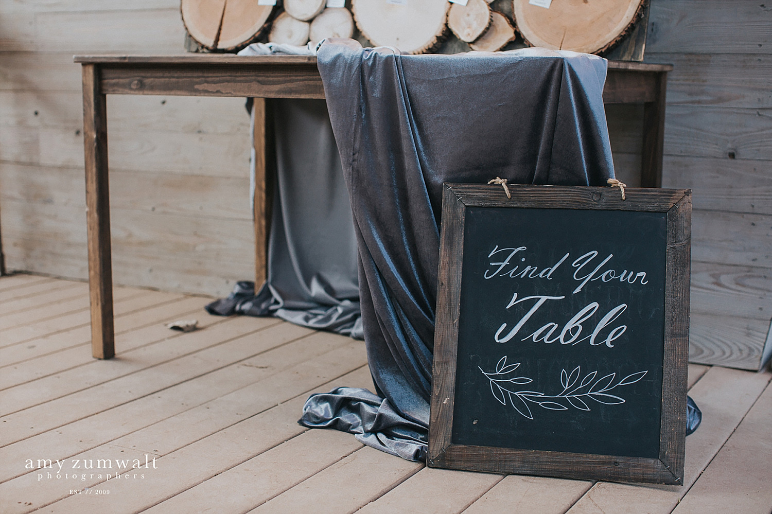 Velvet fabric and a chalk board sign