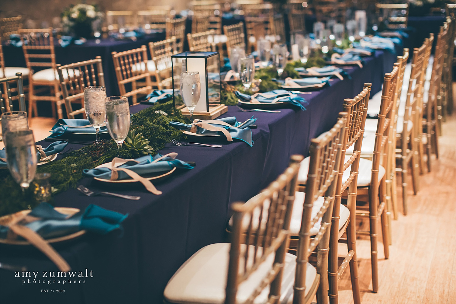 Head table with long evergreen garland