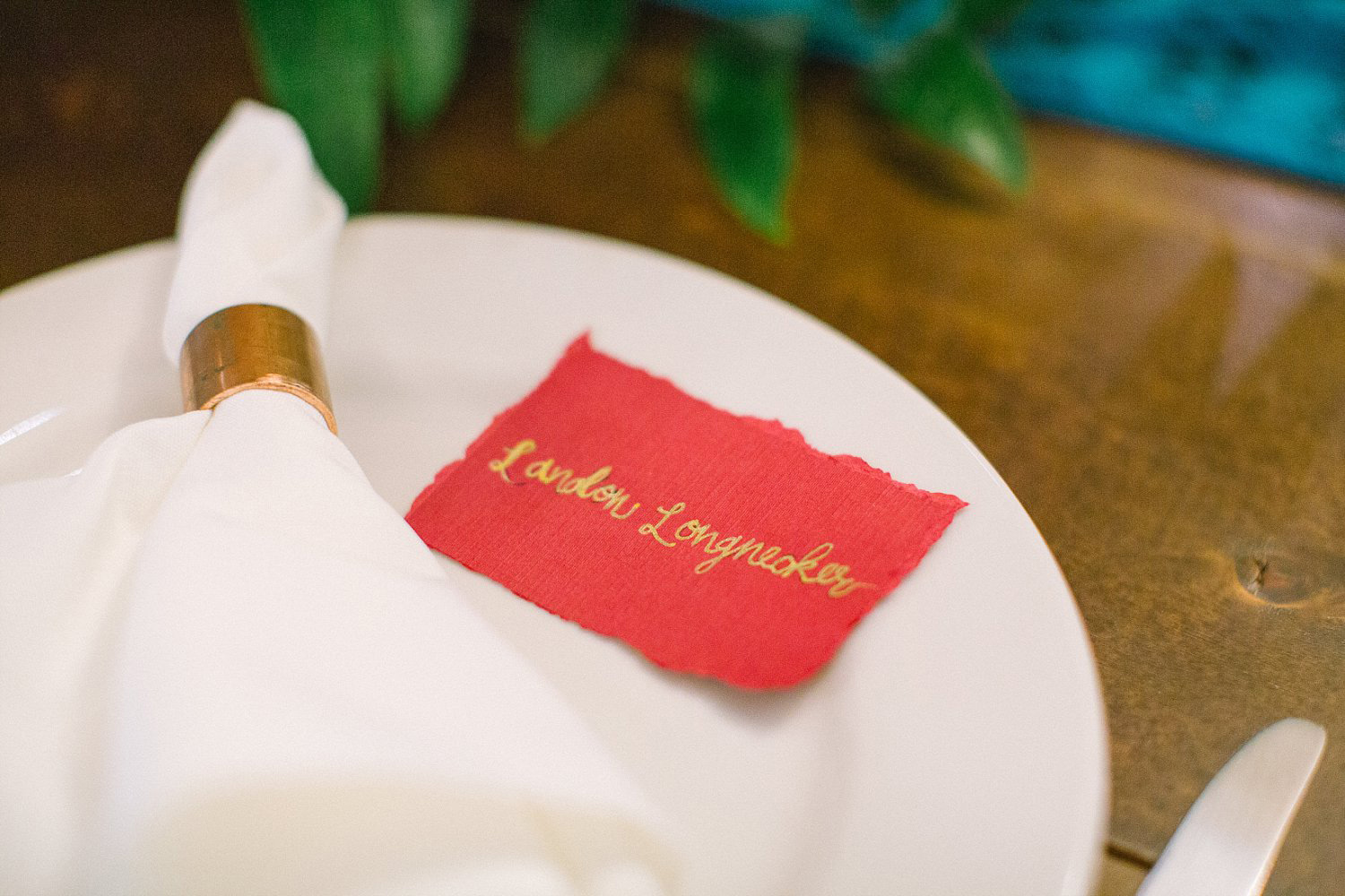 red escort card with torn edges