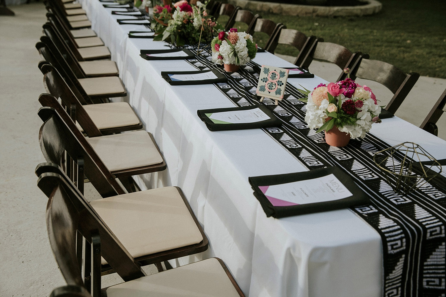 Modern mexicana head table with a black and white mexican pattern runner