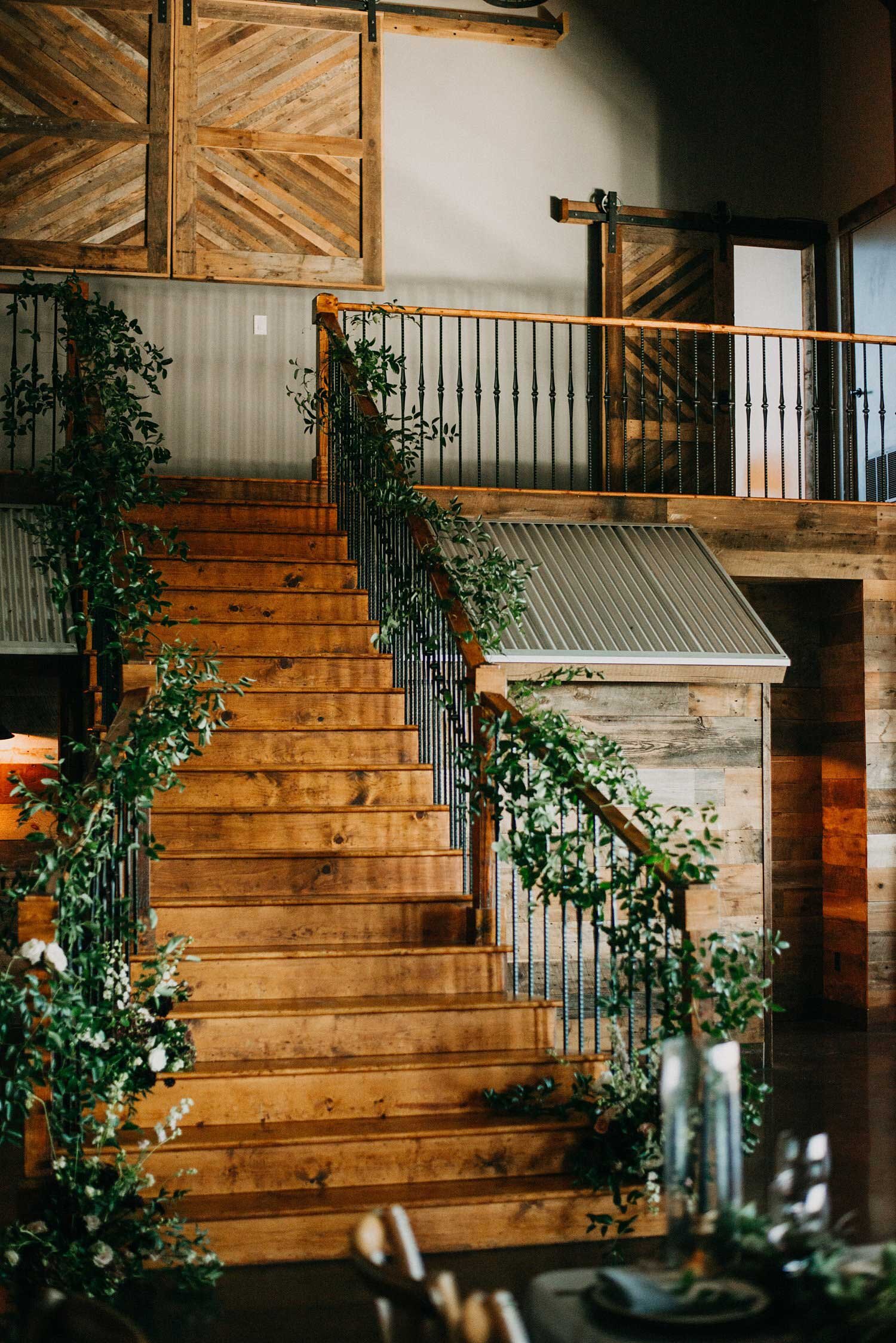 Stair case greenery install at Stone Crest Wedding Venue