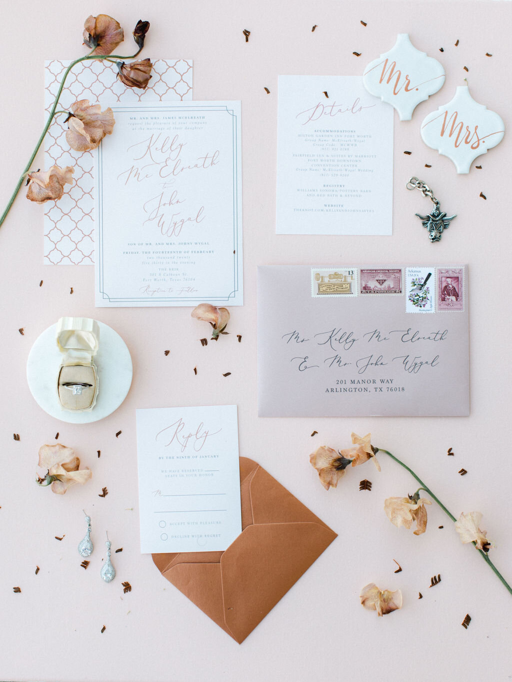 Wedding invitation with orange and mauve envelopes 