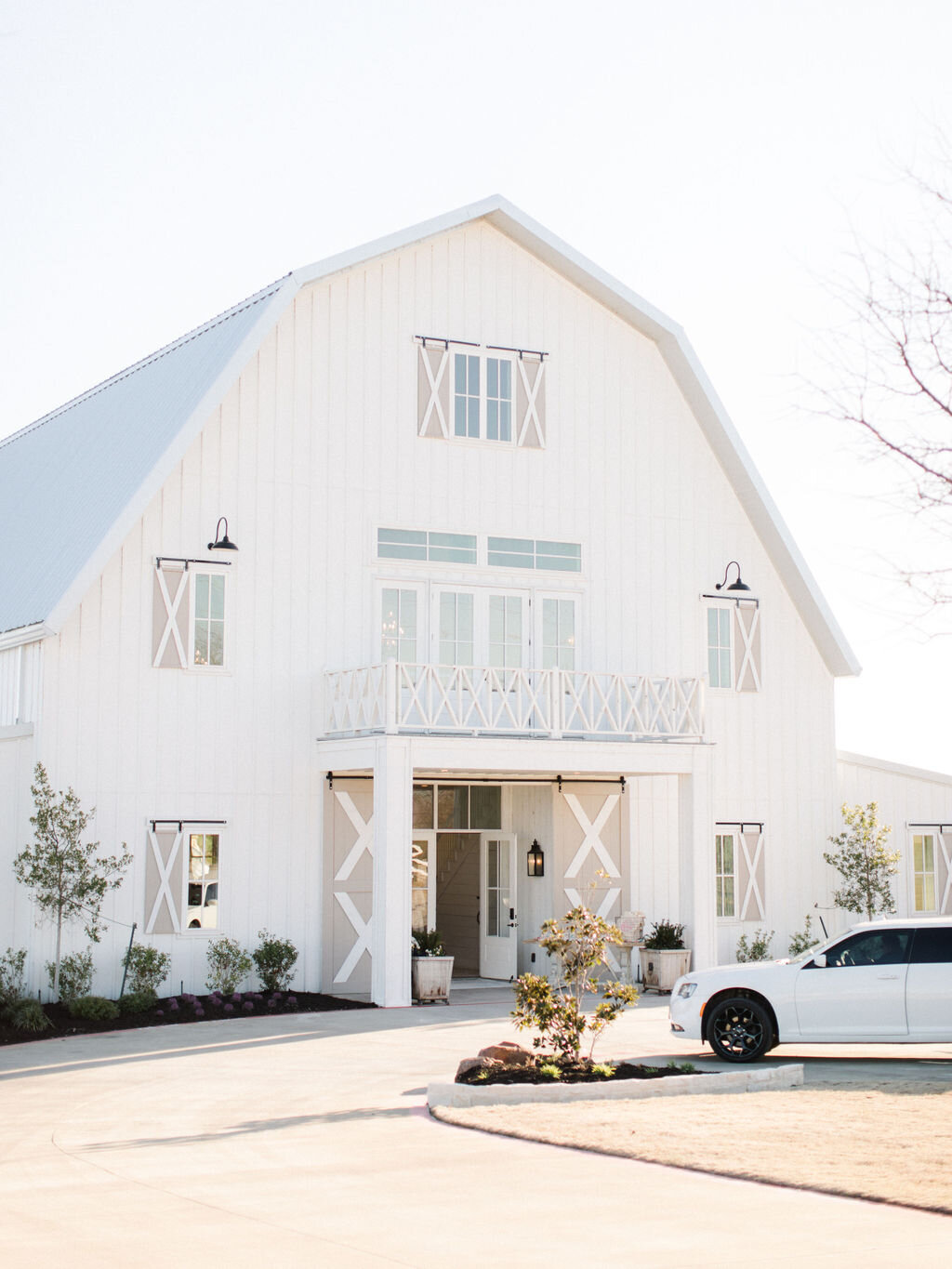 The exterior of the nest at room farms white barn wedding venue