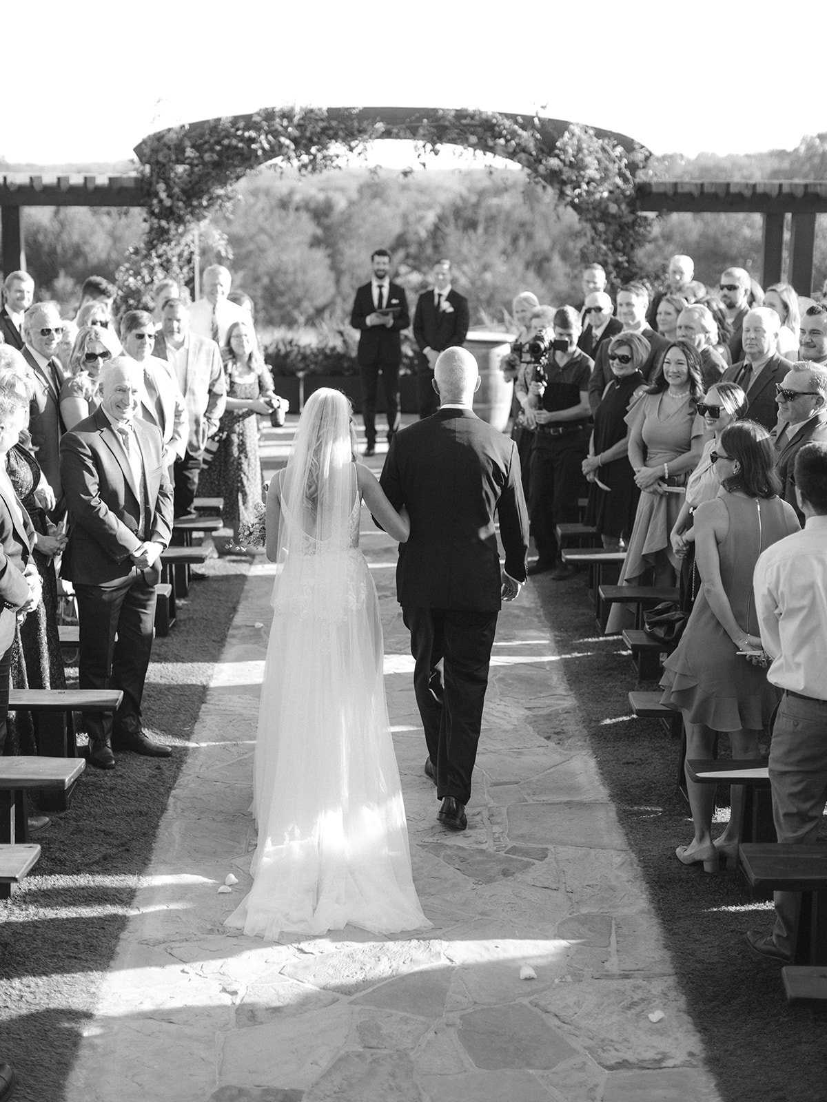 Bride walking down the aisle at Stone Crest Venue in Texas