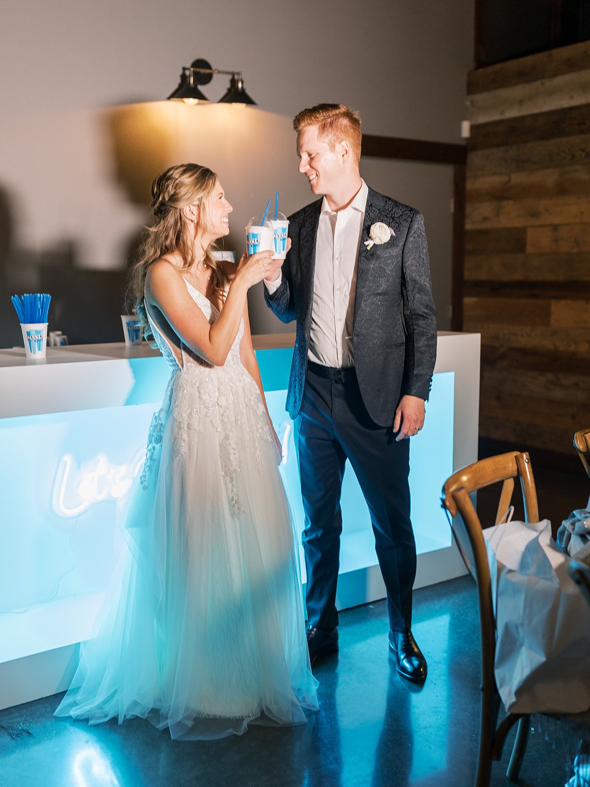 Bride and groom with icee at wedding 