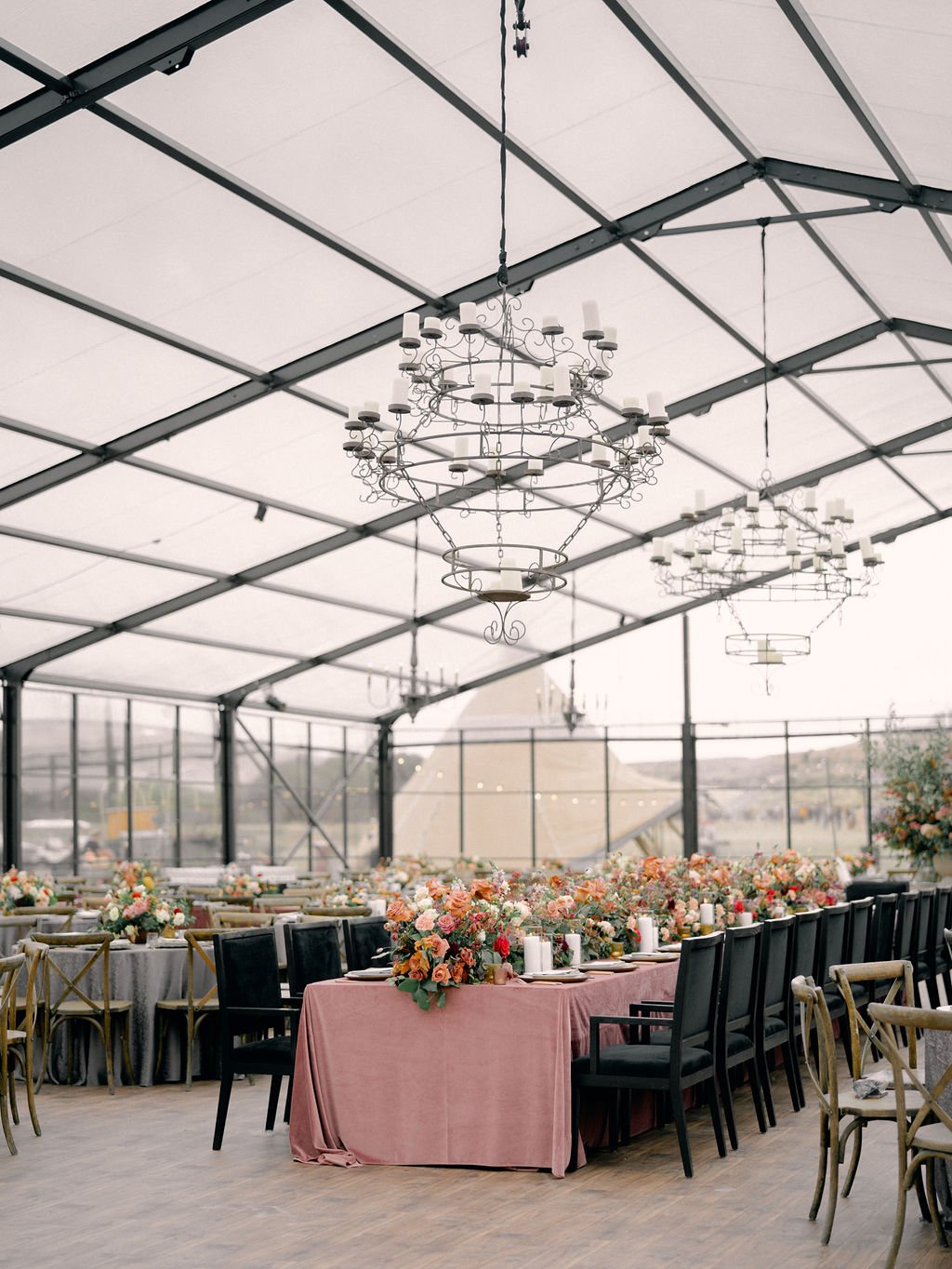 Clear top tent wedding with black structure by Shannon Rose Events