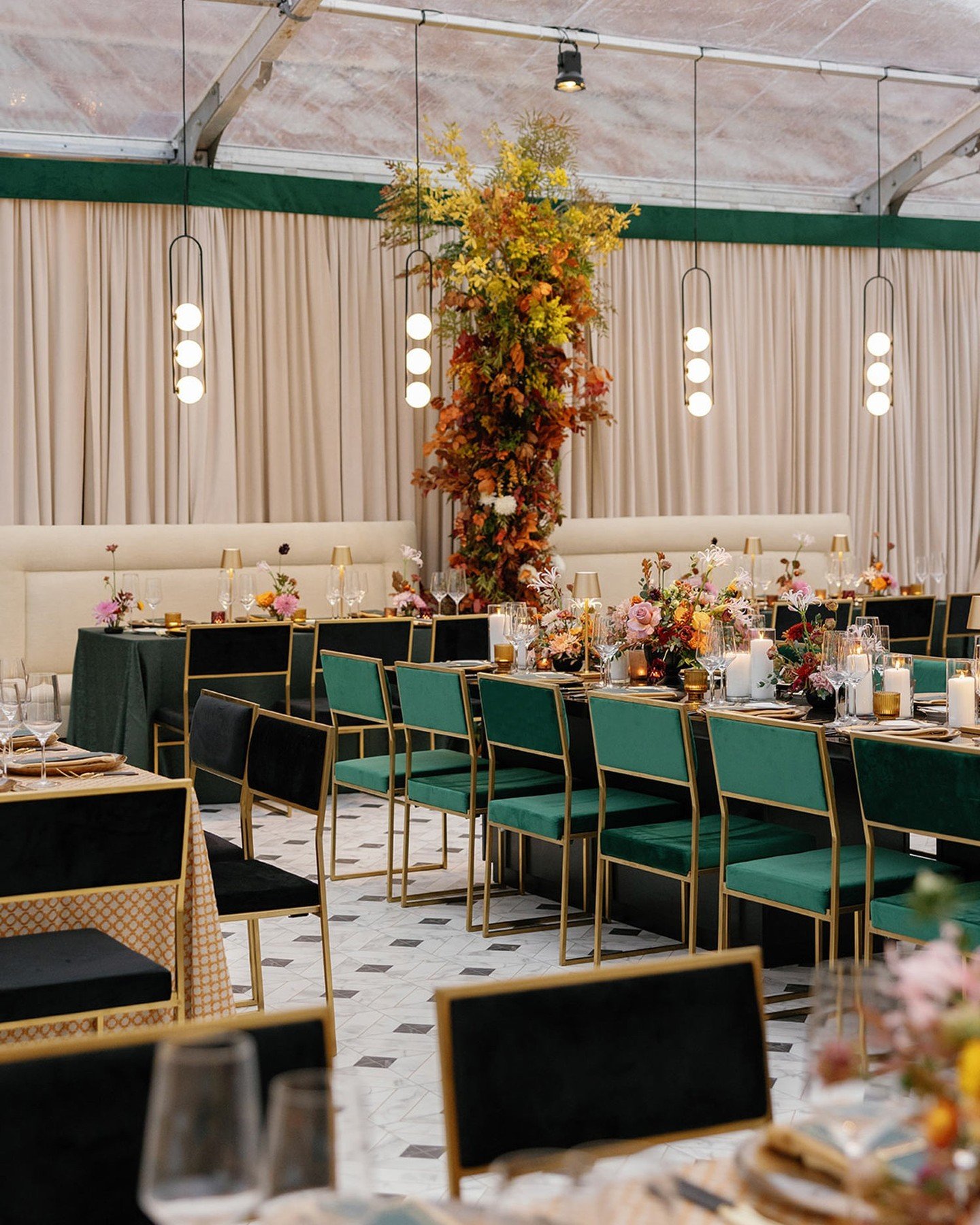 Inspired by the couple&rsquo;s favorite NYC restaurant, we brought a modern twist to this ranch wedding. From replicated flooring to sleek hanging lamps, every detail blends urban chic with Texas charm. Textural pieces break up the benches, creating 