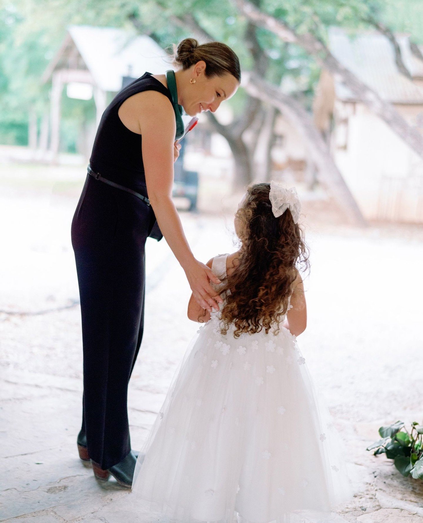 It always catches me off guard when I see myself in wedding albums &mdash; I&rsquo;m so used to living on the outskirts of the action, quietly making sure everything is running smoothly. But I&rsquo;m always thankful for little moments like this that