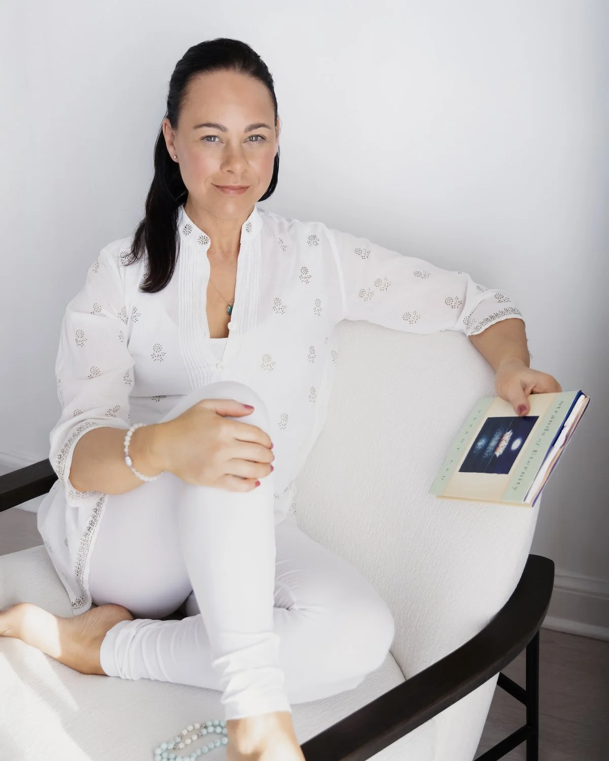 larissa carlson holding book