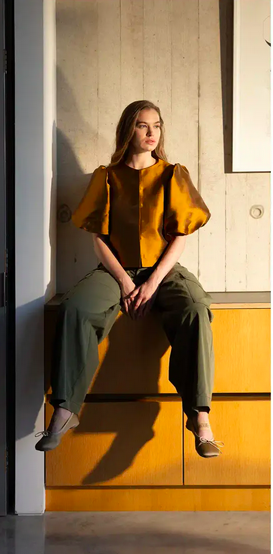 Fenwick Simple Pleasures seated.png