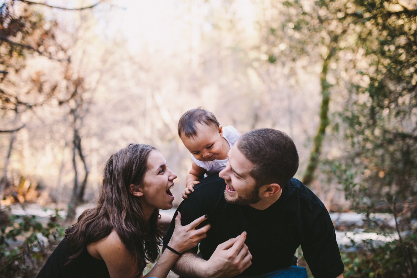 Toddler Climbing on Father's Back Laughing Family Portrait Photography Tuolumne County Forest