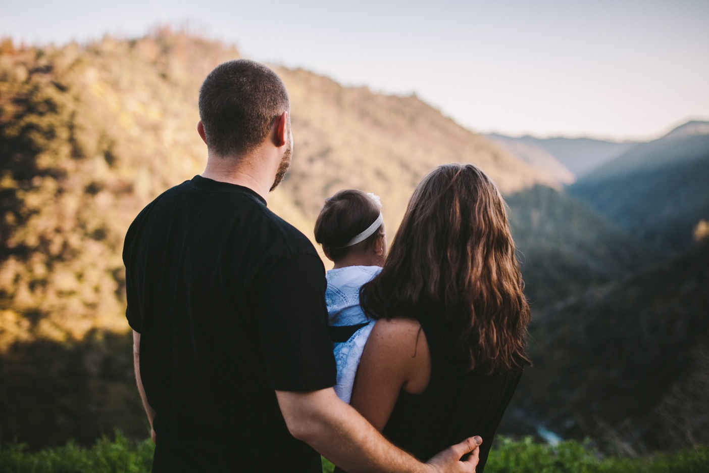 Mother, Father & Daughter Look Out Over Foothills of Sierra Nevada Mountains Tuolumne County