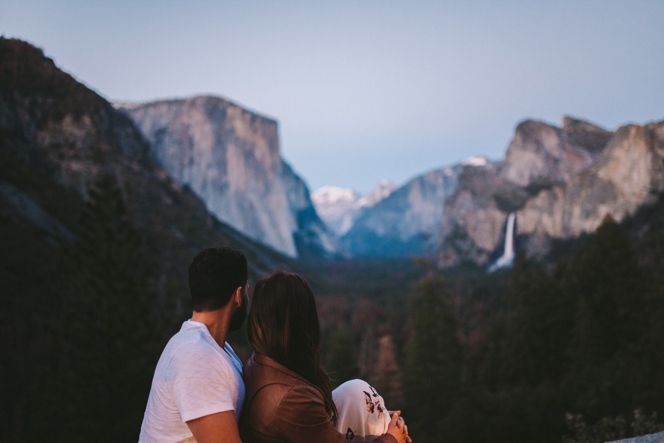 Couple Looking out at Half Dome, Bridal Veil Falls & El Capitan