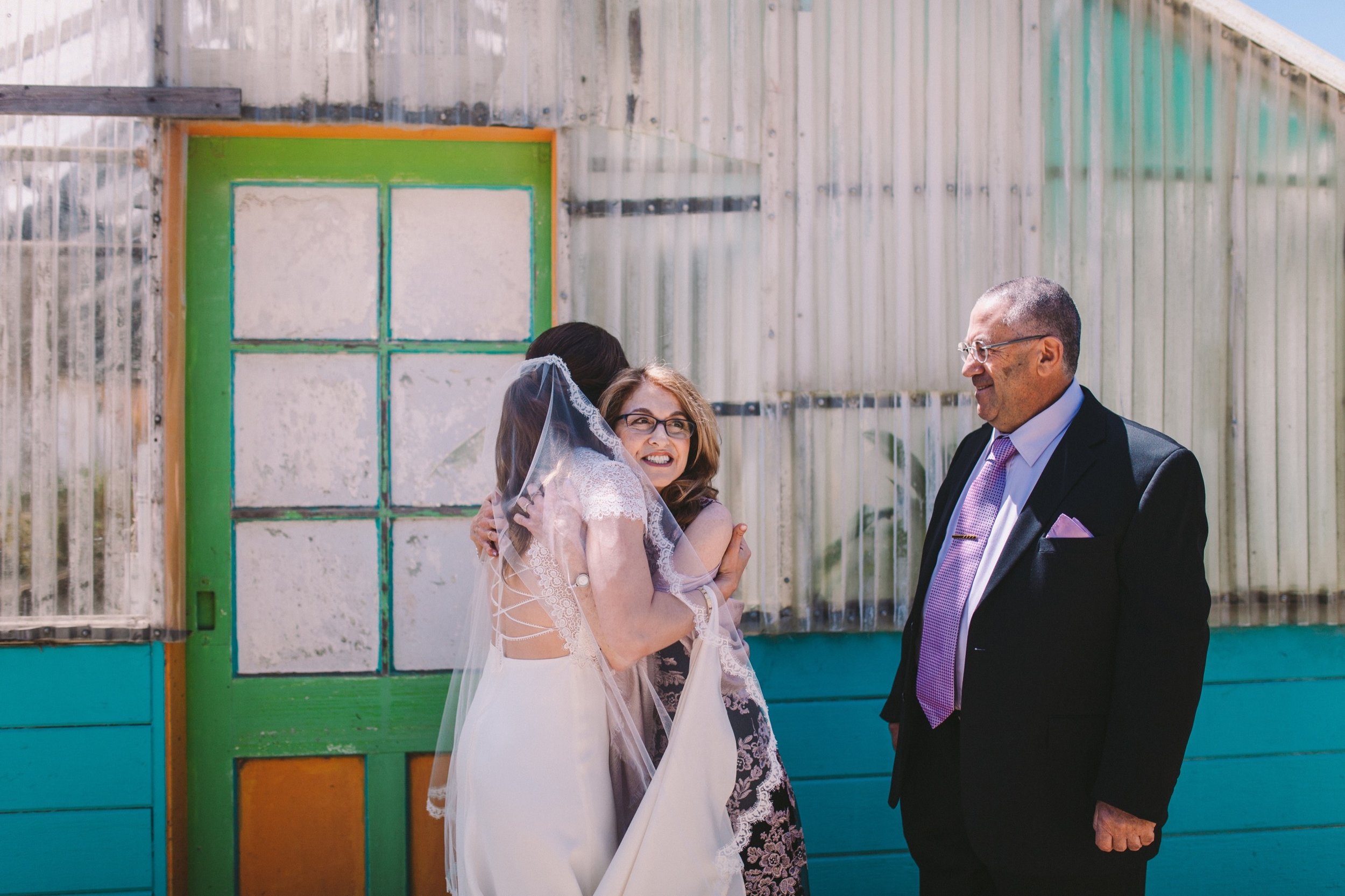Bride First Look with Parents Pacifica Modern Jewish Wedding