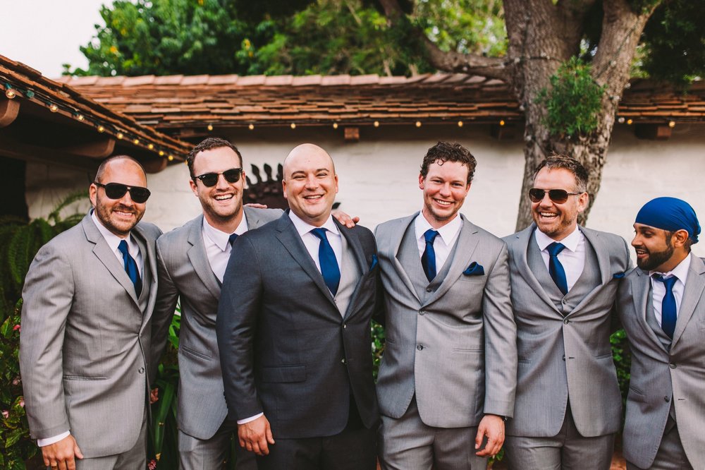 Groomsmen Laughing in Group Shot at Old Rancho Wedding Venue in Carlsbad