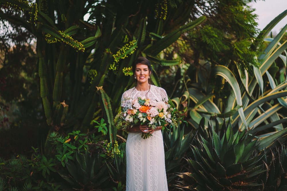 Bride Holding a Bouquet by Flower Frenzy in Encinitas 