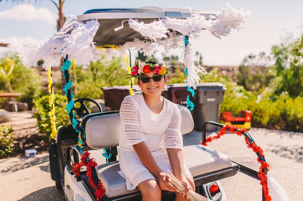 Colorfully Decorated Golf Cart for Wedding Day Transportation