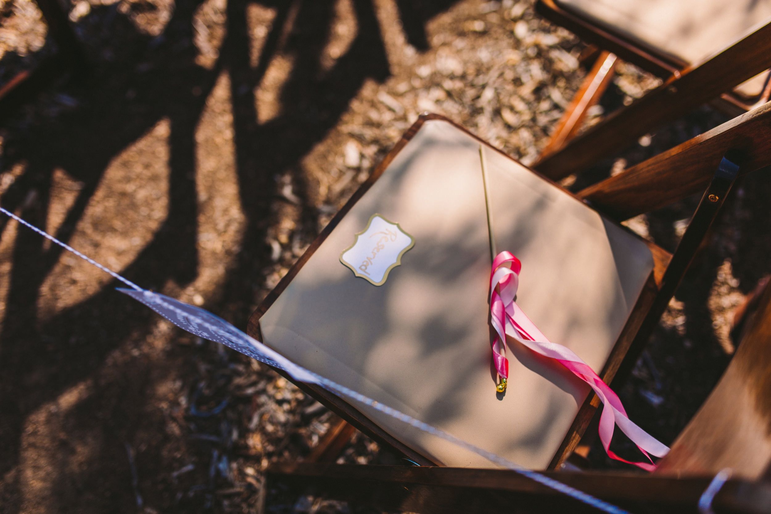 Ribbon Wand on Guest's Chair for Wedding