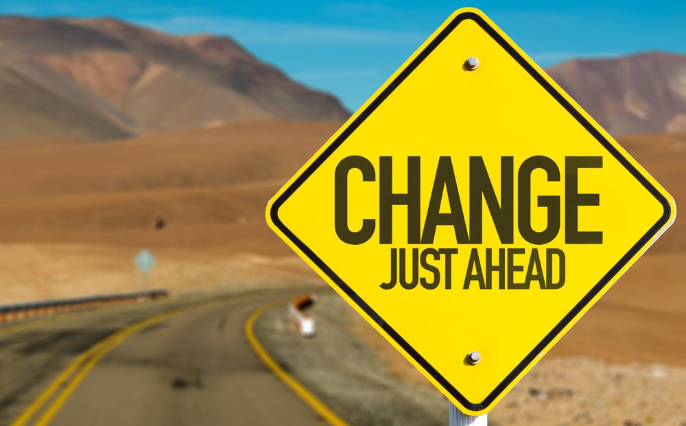 Yellow Yield Sign Change Just Ahead rolling highway.jpeg