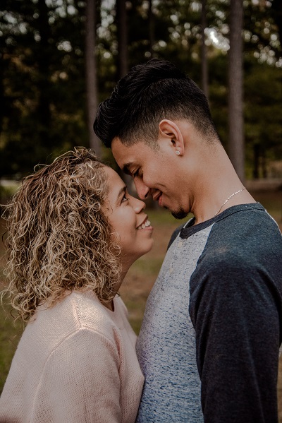 Happy Mixed Race Couple peering into each others eyes small.jpg